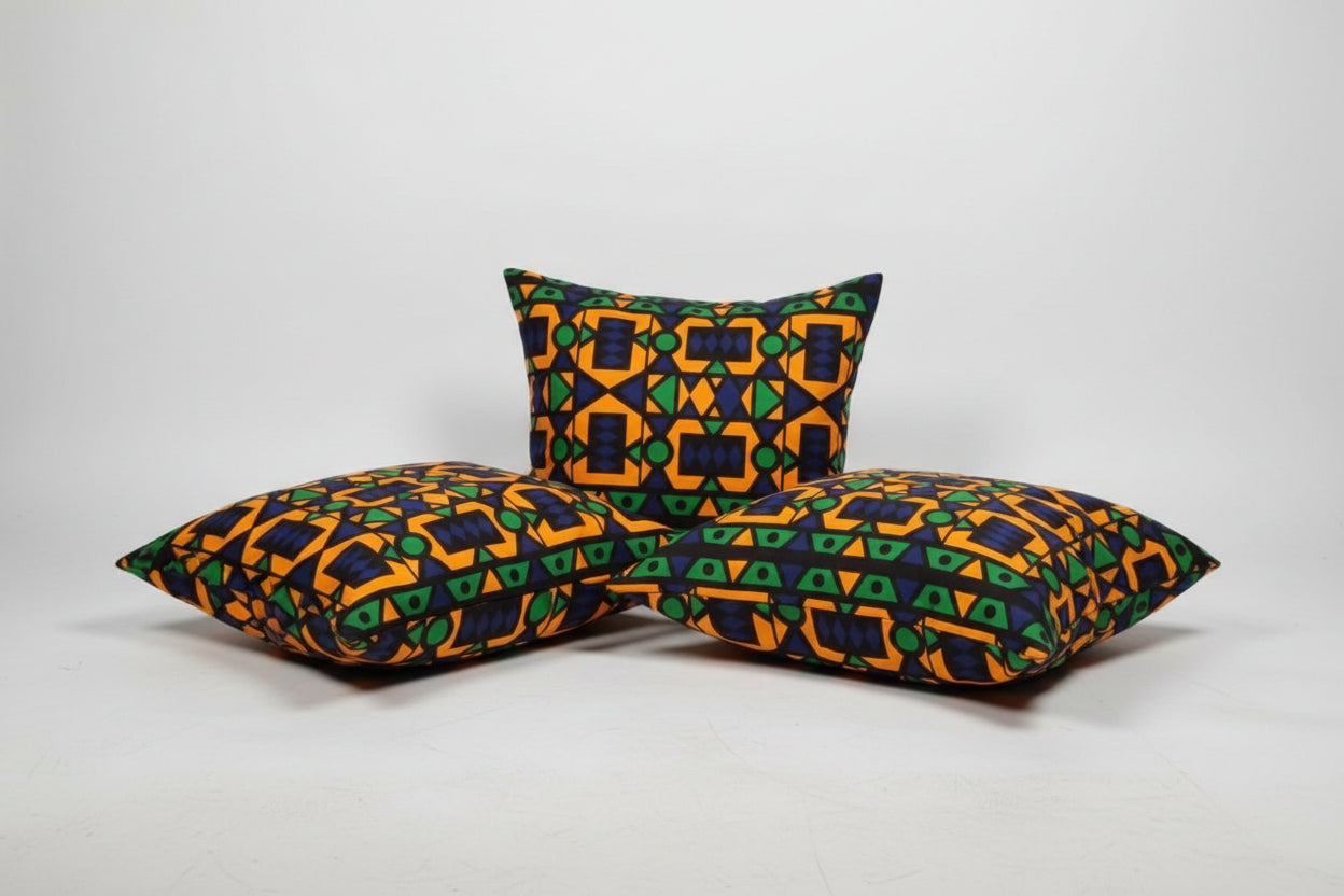 Colorful patterned pillows with 'ANLAVEK' branding on a white background