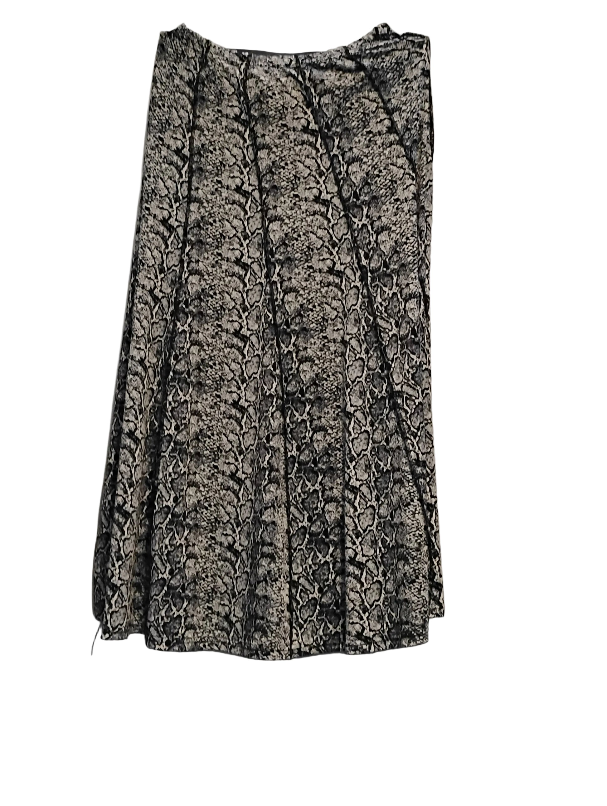 Black and white textured clutch bag on a light-colored surface